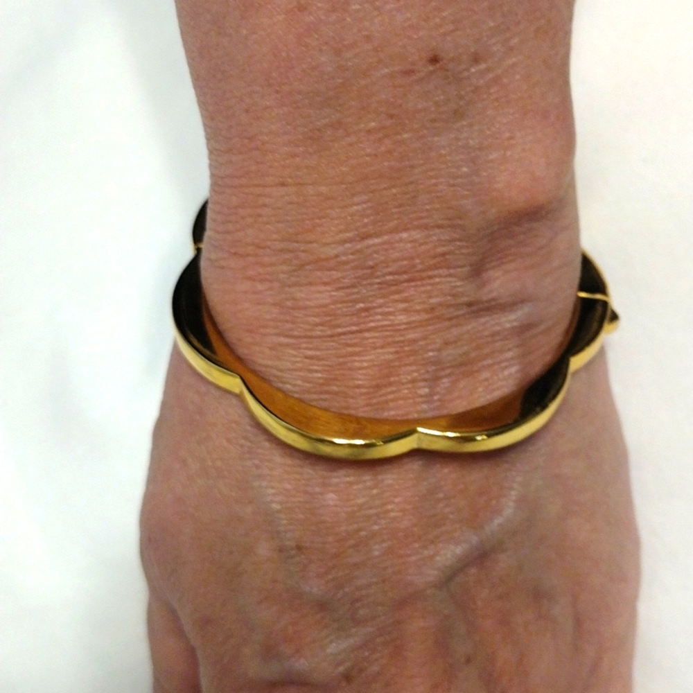Kate Spade, gold plate, scalloped bangle bracelet.